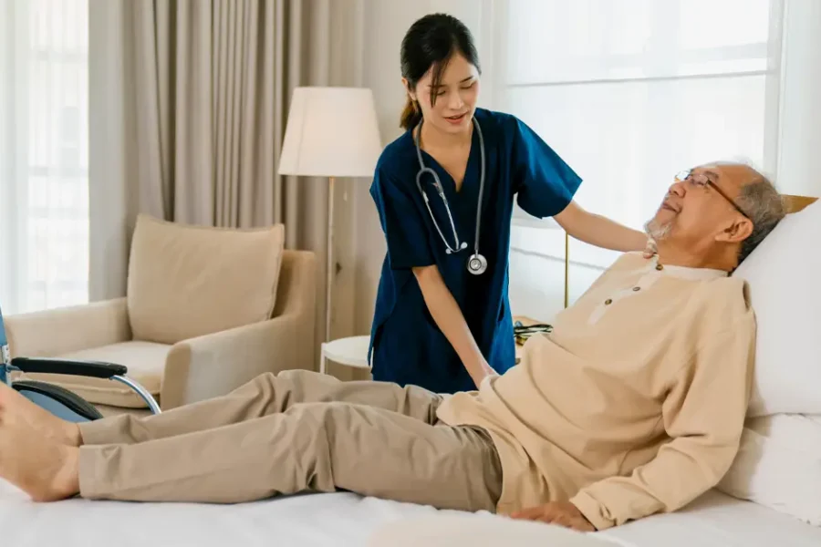 nurse-assisting-patient-postoperative-care-at-home